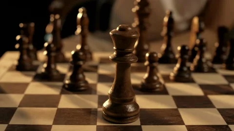Black king's move on the chessboard. Close-up. Cinematic 動画素材 156707828
