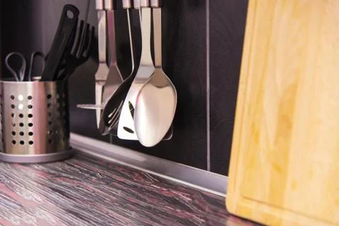Black kitchen with kitchen utensils Fotos Stock