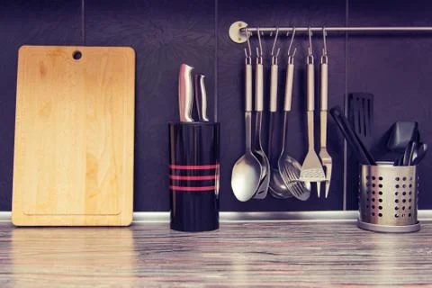Black kitchen with kitchen utensils Stock Photos