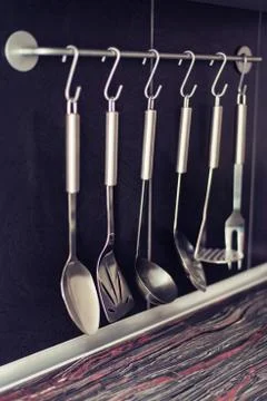 Black kitchen with kitchen utensils Stock Photos