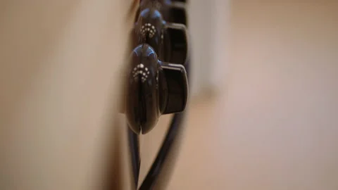 Black knobs of gas stove and oven handle in light kitchen Video stock 168292322