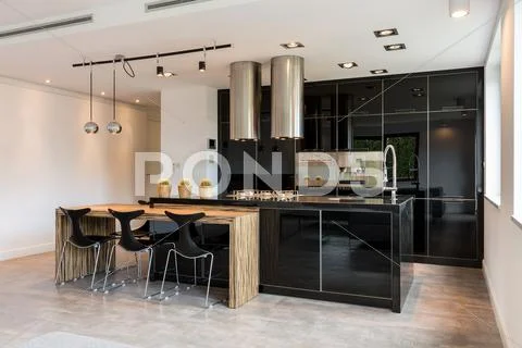 Black lacquered kitchen Stock Photos