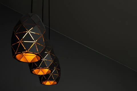 Black lamps with a geometric pattern Stock Photos