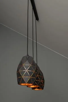 Black lamps with a geometric pattern Stock Photos