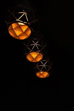 Black lamps with a geometric pattern Stock Photos