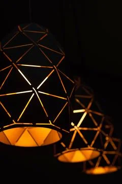 Black lamps with a geometric pattern Stock Photos
