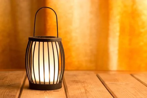 Black lantern with a candle Stock Photos