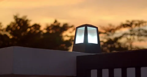 Black lanterns in the evening. Lamp post in the evening.Eexterior wall lights Stock Footage 239363284