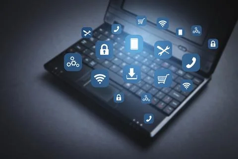 Black laptop computer and apps icons. Stock Photos