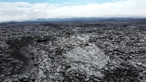 Black lava fields of Tolbachik volcano in Kamchatka, Russia. Stock Footage 247075609