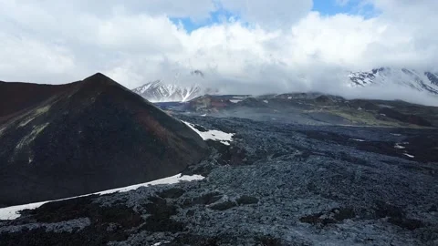 Black lava fields of Tolbachik volcano in Kamchatka, Russia. Stock Footage 247075613