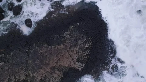 Black Lava Rocks with Ocean Waves Stock Footage 322827106