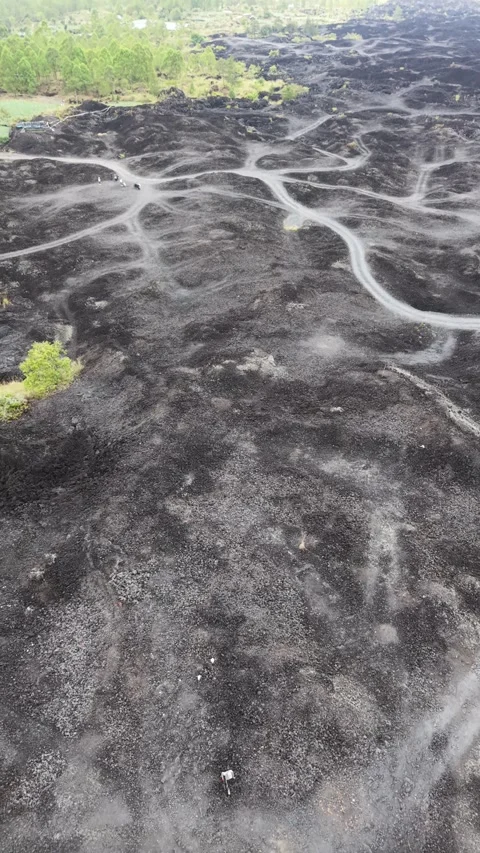 Black Lava Stone Texture to Batur Volcanic Landscape Stock Footage 337419849