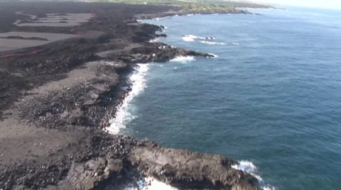 Black Lava Undeveloped Coastline with Surf  Shot from a Helicopter Stock Footage 5234762