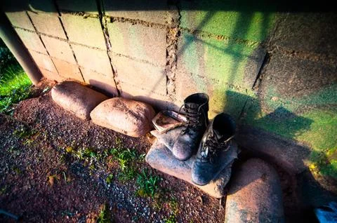 Black Leather Army Boots old and dirty Stock Photos