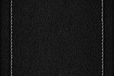 Black leather background Stock Photos