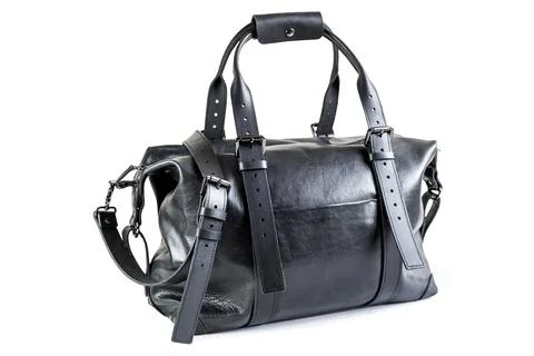 Black leather bag isolated on white background Stock Photos