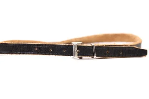  Black leather belt with a rectangular buckle Black leather belt with a re... Stock Photos