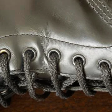 Black leather boot with laces Stock Photos