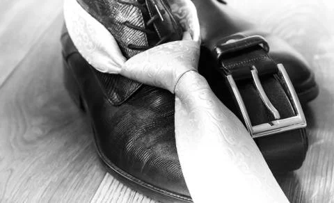 Black leather boot strap and tie Stock Photos