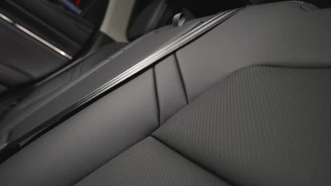 Black leather car interior. Modern car interior, interior parts, interior detail Stock Footage 309403433