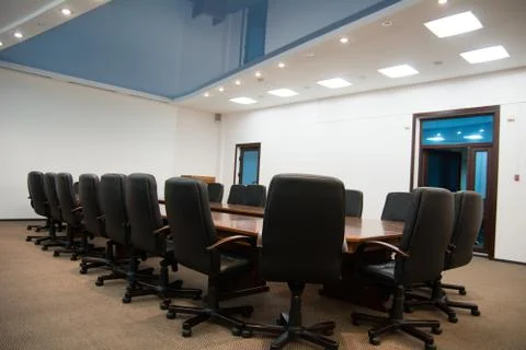 Black leather chairs with a table Foto stock