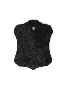 Black leather patch tag with snap button close up Stock Photos