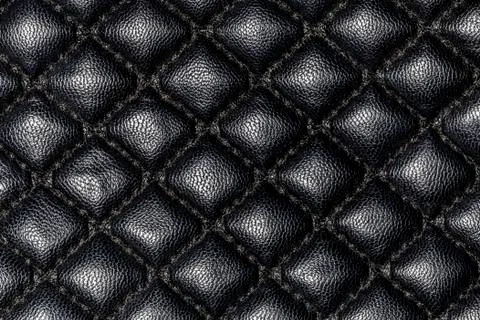 Black leather with rhombus texture Stock Photos