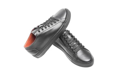 Black leather sneakers. Stock Photos
