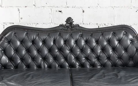 Black leather sofa Stock Photos