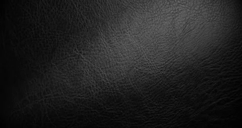 Black leather surface. 库存影片 335126012