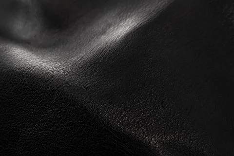 Black leather texture. Abstract background of dark leather with small rough.. Foto stock