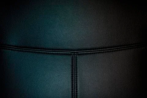 Black leather texture background surface with seam. Stock Photos