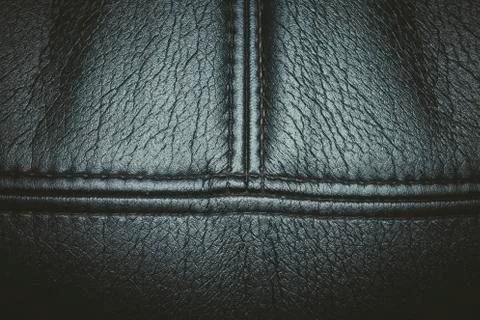 Black leather texture background surface with seam. Stock-Fotos