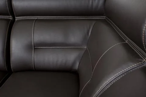 Black leather texture close-up, couch Stock Photos