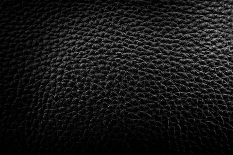 Black leather texture with gradient. Background made of genuine leather Stock Photos