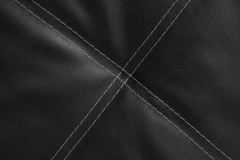 Black leather texture with white stitching detail, upholstery material backgr Stock Photos