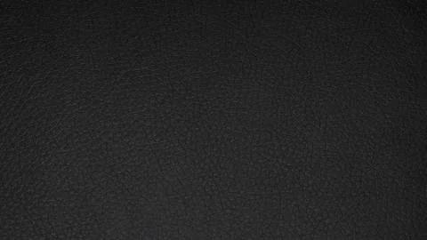Black leather textured background.Texture-the smooth black leather. Stock Photos