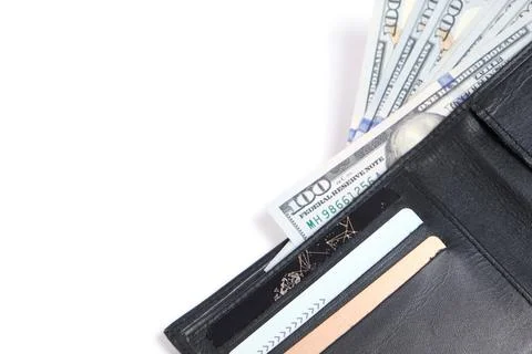 Black leather wallet with stack hundred dollar bills and bank cards Stock Photos