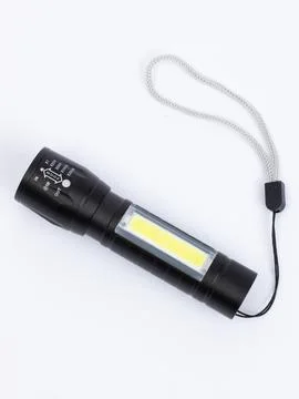 Black LED flashlight on white background Stock Photos