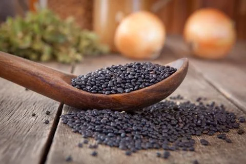 Black lentils Stock Photos