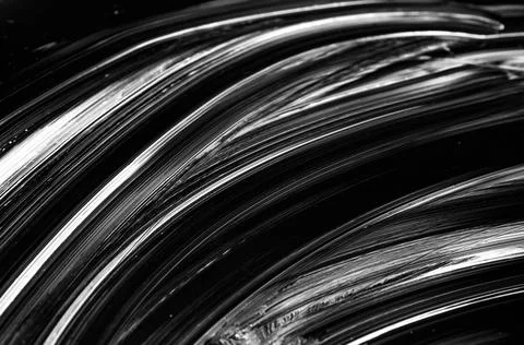 Black lines on a black background . Stock Photos