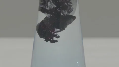 BLACK LIQUID DROPPED INTO WATER SCIENCE LAB Stock Footage