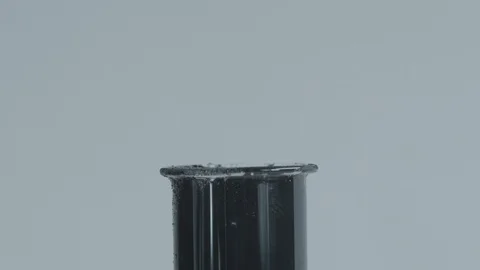 Black Liquid Overflowing Out Of Test Tube Stock Footage 126908519