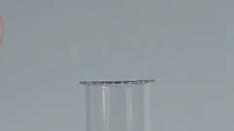 Black Liquid Overflowing Out Of Test Tube Stock Footage 126908784