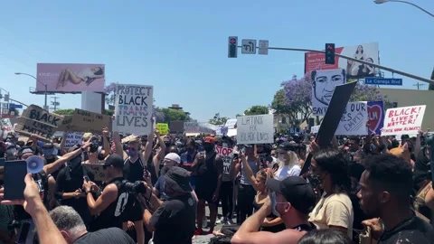 Black Lives Matter Protest in Los Angeles, Hundreds of People With Banner Stock Footage
