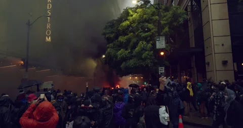 Black Lives Matter Rioting and Burning Buildings in Downtown Seattle Stock Footage