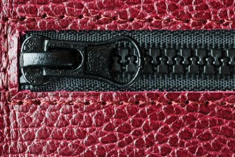 Black lock with lightning on a red textural background Stock Photos