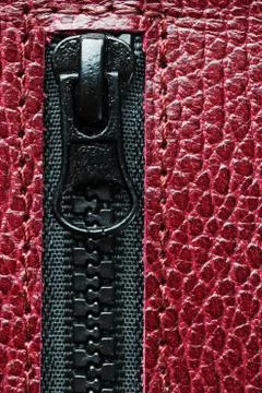 Black lock with lightning on a red textural background Stock Photos