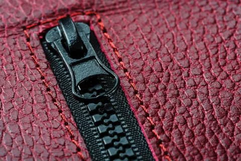 Black lock with lightning on a red textural background Stock Photos